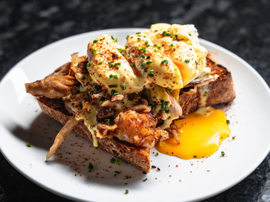Hog Shoulder Benny: pulled pork shoulder and poached eggs on toast with hollandaise and a runny yolk